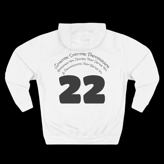 White hoodie with black text and numbers on a white background