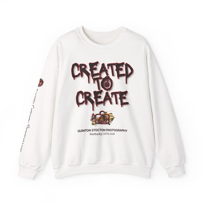 White sweatshirt with 'Created to Create' text and photography logo on a white background