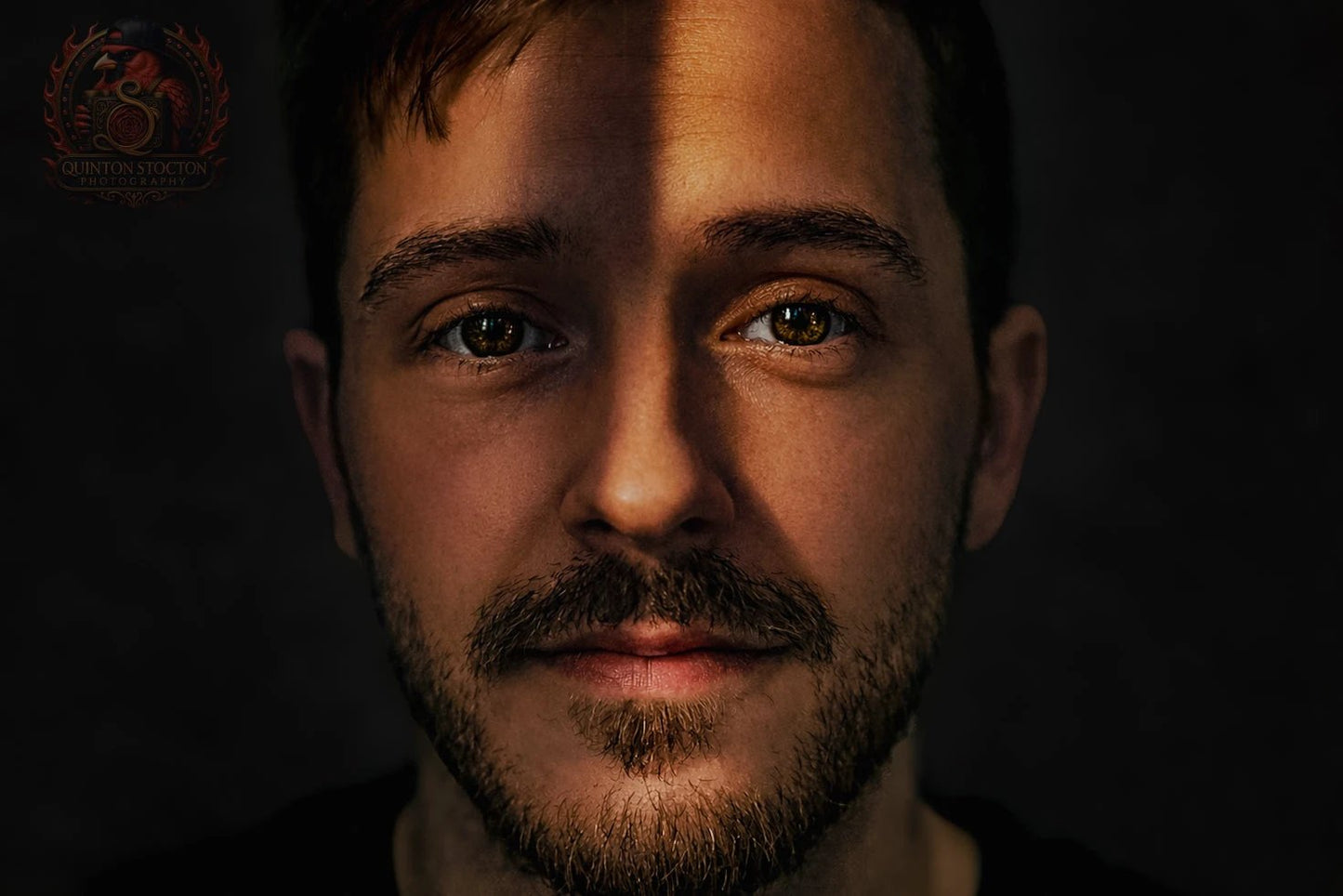 Portrait of a man with dramatic shadow across face, creative studio photography, Quinton Stocton Photography