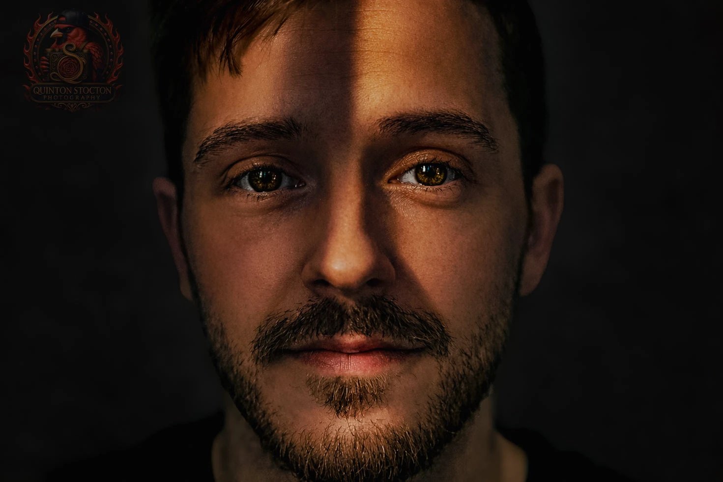Portrait of a man with dramatic shadow across face, creative studio photography, Quinton Stocton Photography