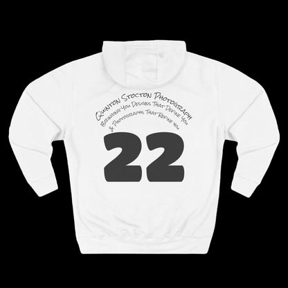 White hoodie with black text and numbers on a white background