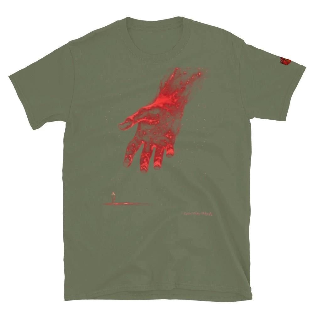 The Reach Cinematic Art T-Shirt with a glowing red hand reaching toward a lone figure on an olive tee.